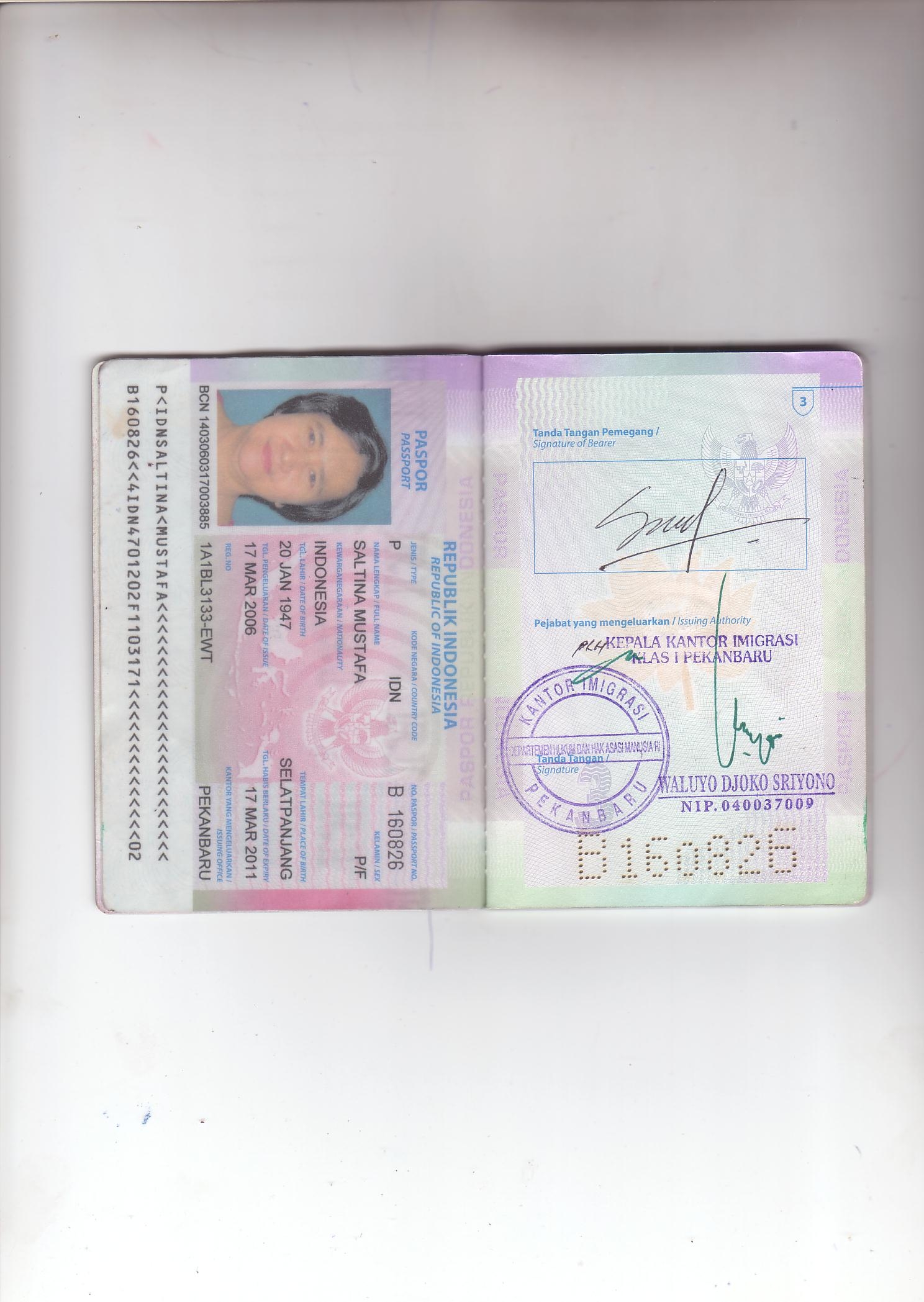 Passport Halaman 2 dan 3  Travel Information Manual